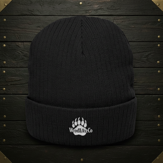 Black Grizzly Beanie on Wood Background
